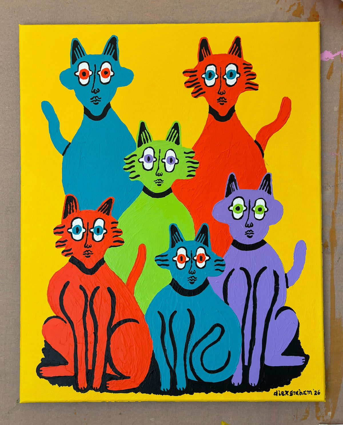 6 cats on yellow