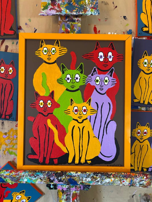 6 cats on brown. Framed