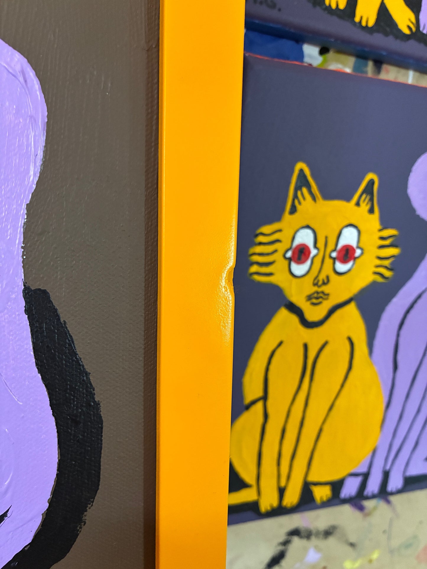 6 cats on brown. Framed